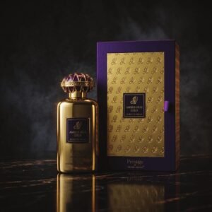 Amber Oud Gold bottle and gift box on black marble